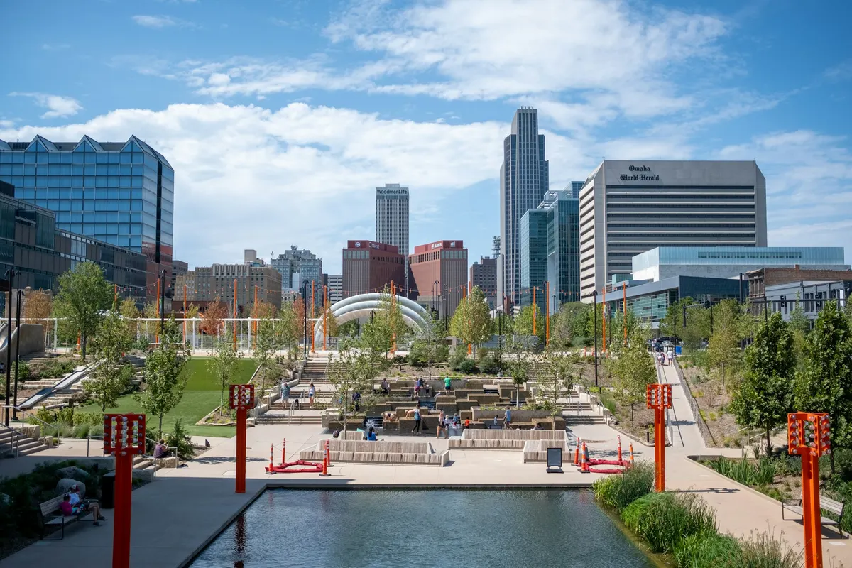 Downtown Omaha towers above the rebuilt riverfront park and its water features